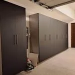 a room with black cabinets