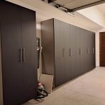 a room with black cabinets